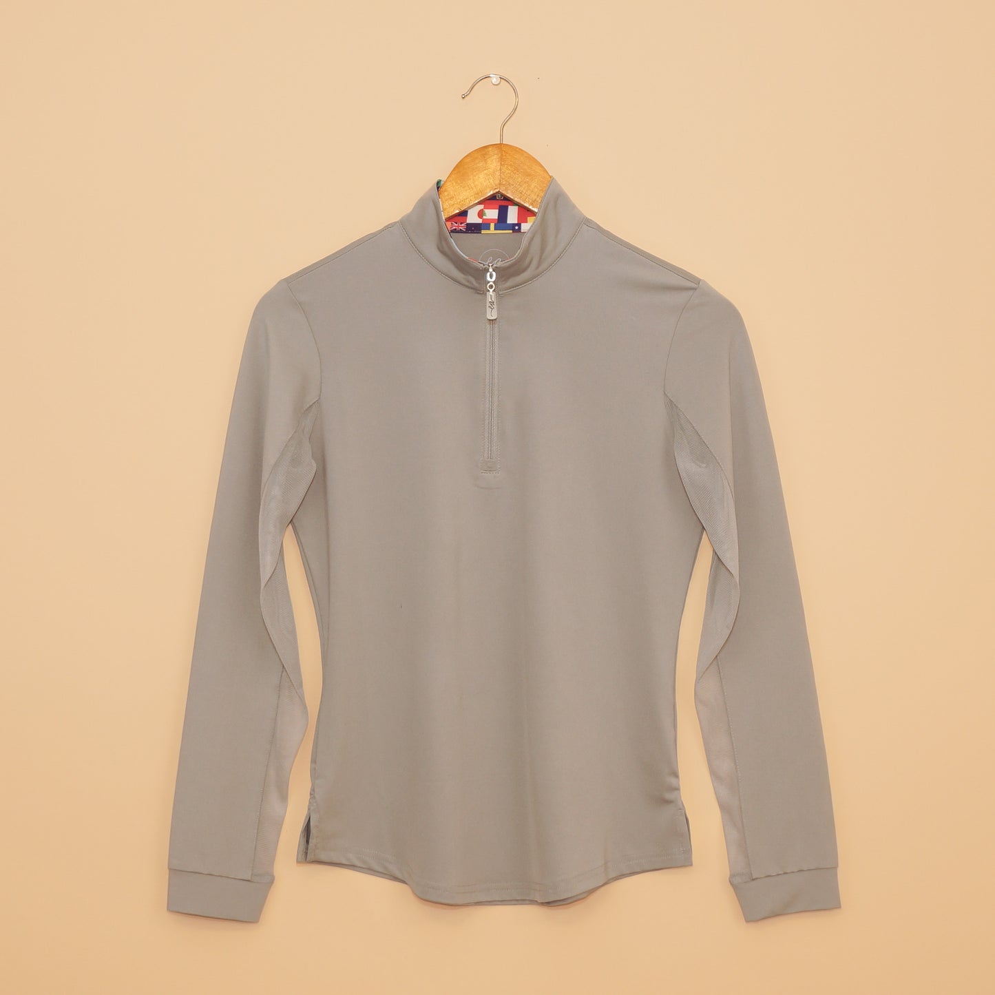 EA Limited Inc. International Sun Shirt in sleek gray with UPF 50+ protection, quarter-zip design, and a unique collar featuring a vibrant print of international flags on the inside.