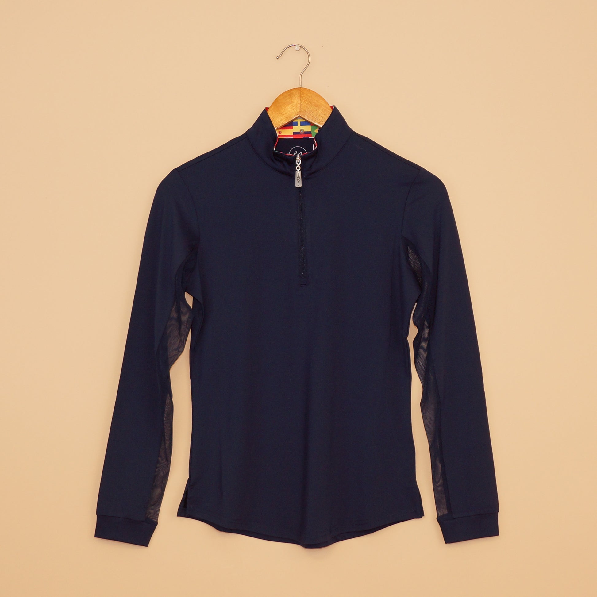 EA Limited Inc. International Sun Shirt in classic navy with UPF 50+ protection, quarter-zip design, and a unique collar featuring a vibrant print of international flags on the inside.