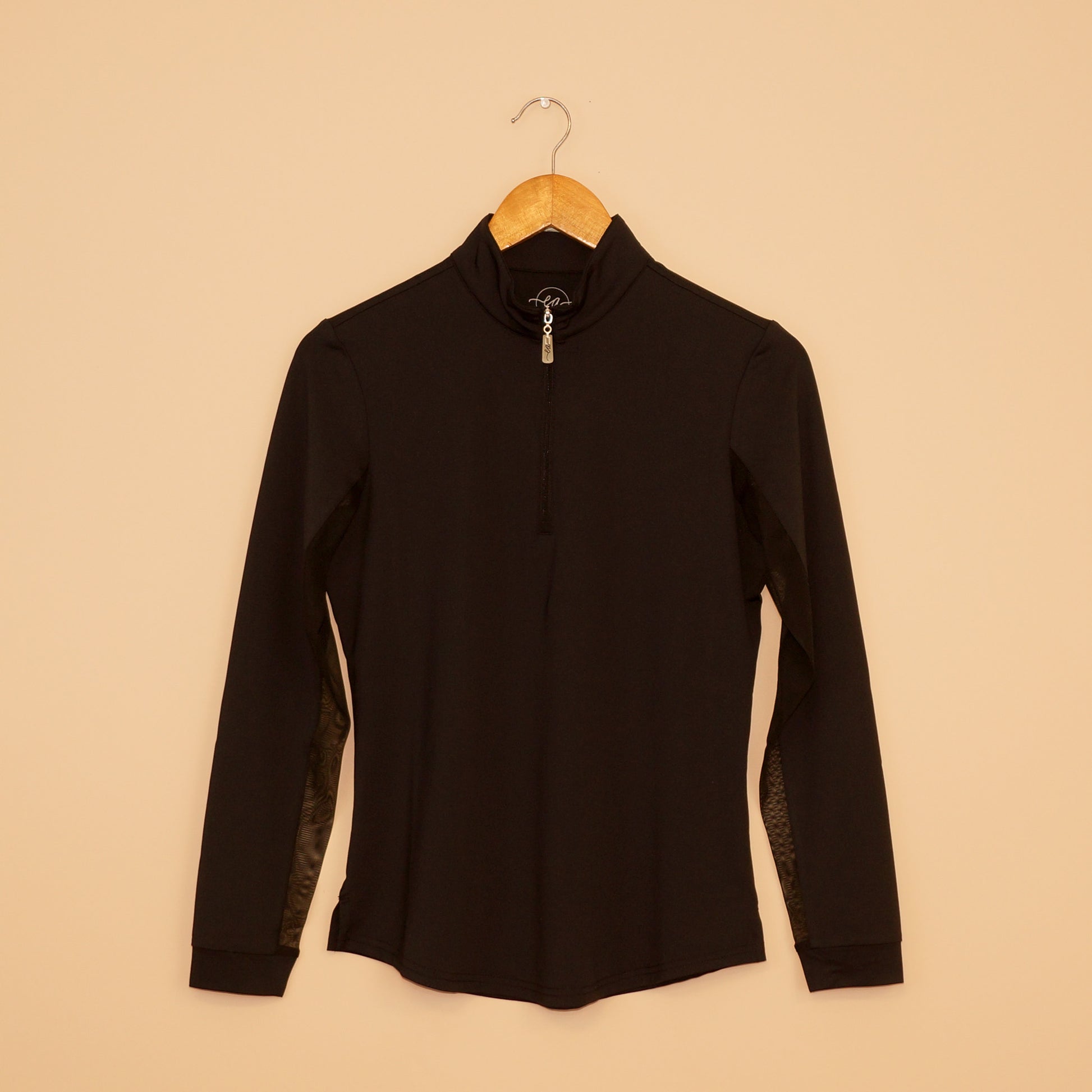 Black quarter-zip Sun Shirt by EA Limited Inc. with UPF 50+ sun protection, featuring a sleek design and comfortable fit.